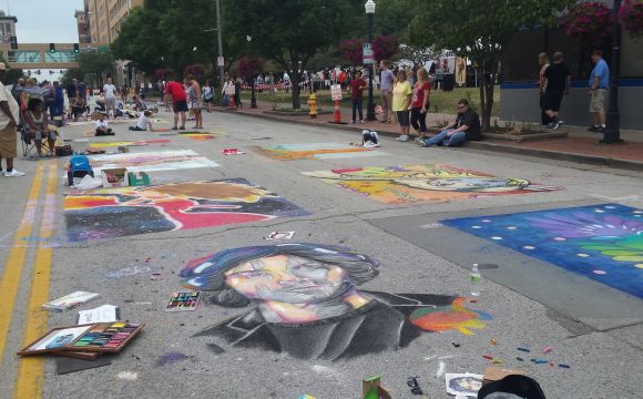imagery of chalk dark on the street during a festival in downtown davenport iowa 