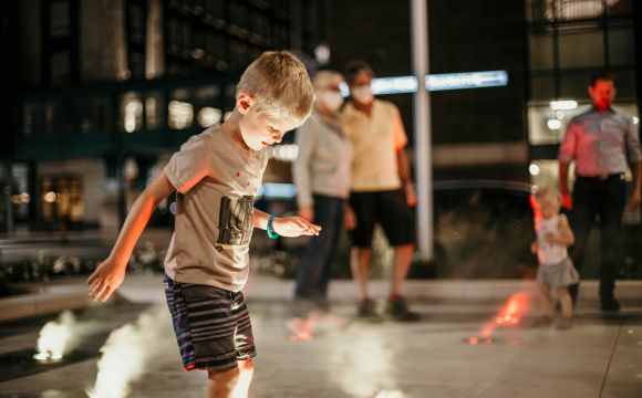 Ksquare kid by fountain