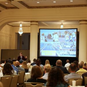 Kyle Carter speaking at Annual Meeting