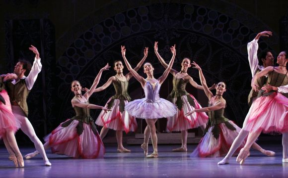 dancers on stage performing at a show in davenport iowa 