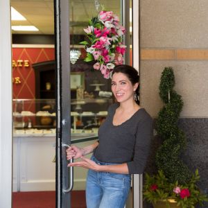 image of randyl mohr opening the door to chocolate manor