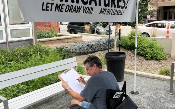 Leo Kelly drawing Caricatures